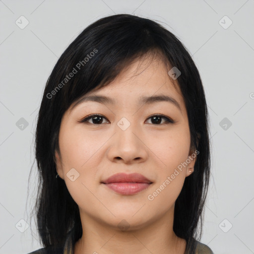 Joyful asian young-adult female with medium  black hair and brown eyes