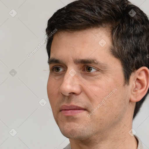 Neutral white adult male with short  brown hair and brown eyes