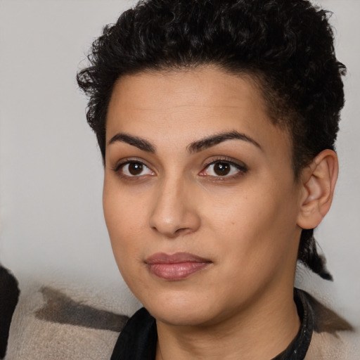 Neutral latino young-adult female with short  black hair and brown eyes