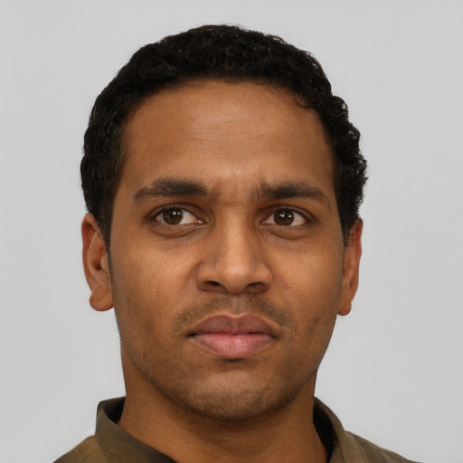 Neutral black young-adult male with short  black hair and brown eyes