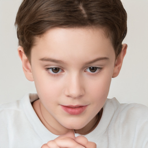 Joyful white child female with short  brown hair and brown eyes