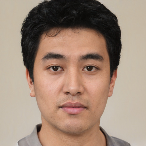 Neutral asian young-adult male with short  black hair and brown eyes