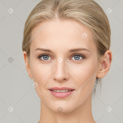 Joyful white young-adult female with medium  brown hair and blue eyes