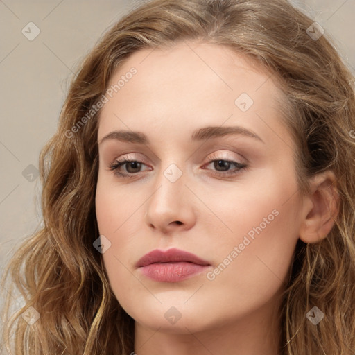 Neutral white young-adult female with long  brown hair and brown eyes