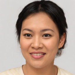 Joyful white young-adult female with medium  brown hair and brown eyes