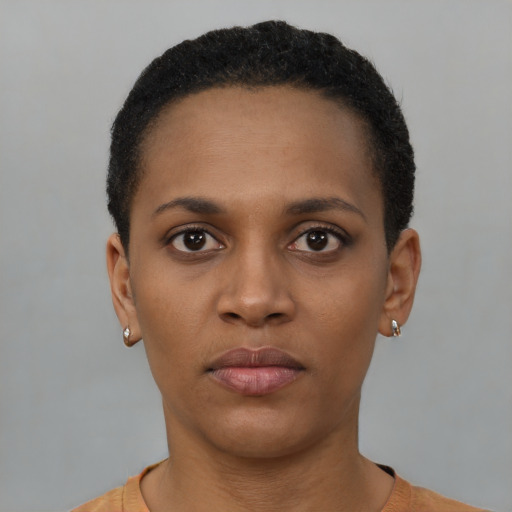 Neutral latino young-adult female with short  black hair and brown eyes