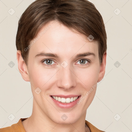 Joyful white young-adult female with short  brown hair and grey eyes