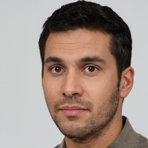 Neutral white young-adult male with short  black hair and brown eyes