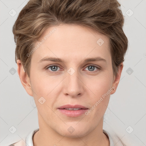 Joyful white young-adult female with short  brown hair and grey eyes