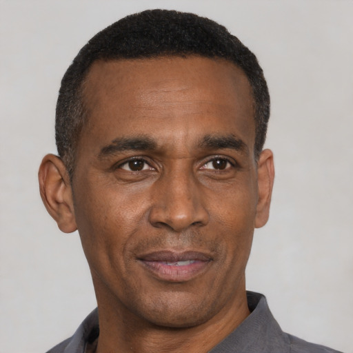 Neutral black adult male with short  black hair and brown eyes