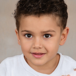 Joyful white child male with short  brown hair and brown eyes