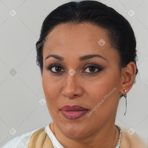 Joyful latino young-adult female with short  brown hair and brown eyes