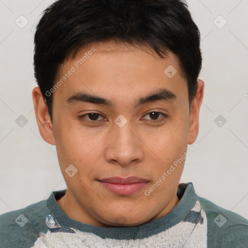 Joyful asian young-adult male with short  brown hair and brown eyes