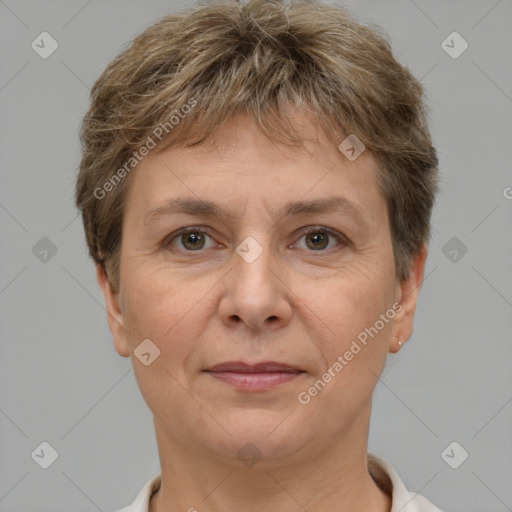 Joyful white adult female with short  brown hair and brown eyes