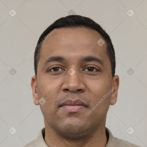 Neutral latino young-adult male with short  black hair and brown eyes