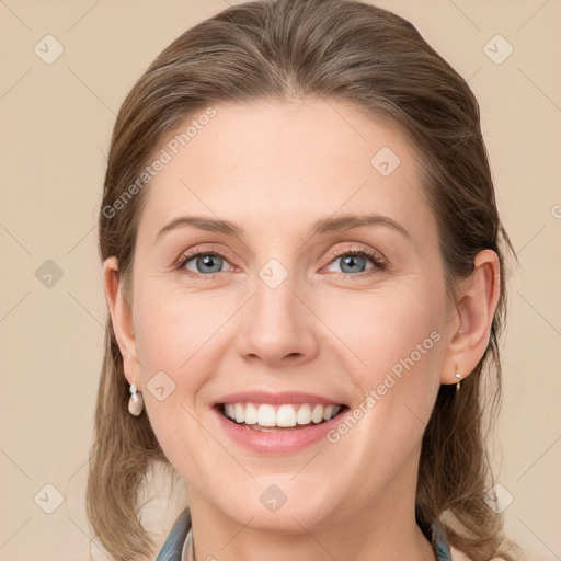 Joyful white young-adult female with medium  brown hair and grey eyes