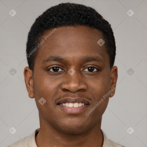 Joyful black young-adult male with short  brown hair and brown eyes