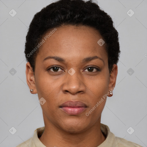 Joyful black young-adult female with short  black hair and brown eyes