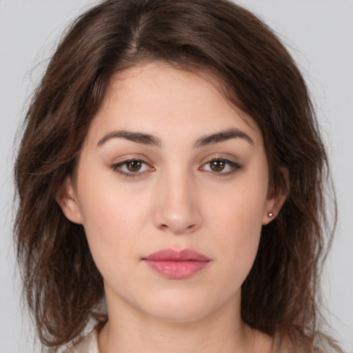 Neutral white young-adult female with medium  brown hair and brown eyes