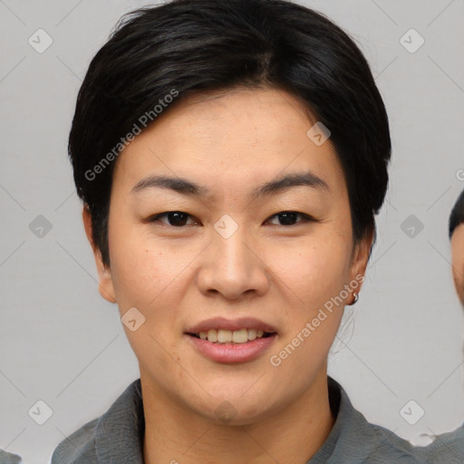 Joyful asian young-adult female with short  black hair and brown eyes