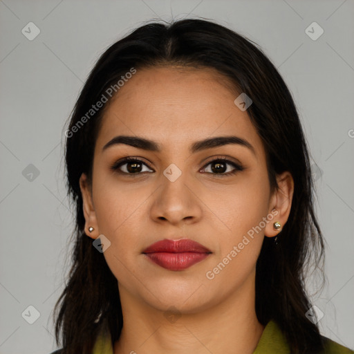 Joyful latino young-adult female with long  brown hair and brown eyes