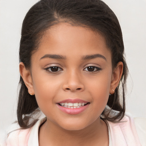 Joyful white child female with long  brown hair and brown eyes