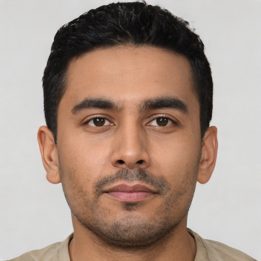 Neutral latino young-adult male with short  black hair and brown eyes