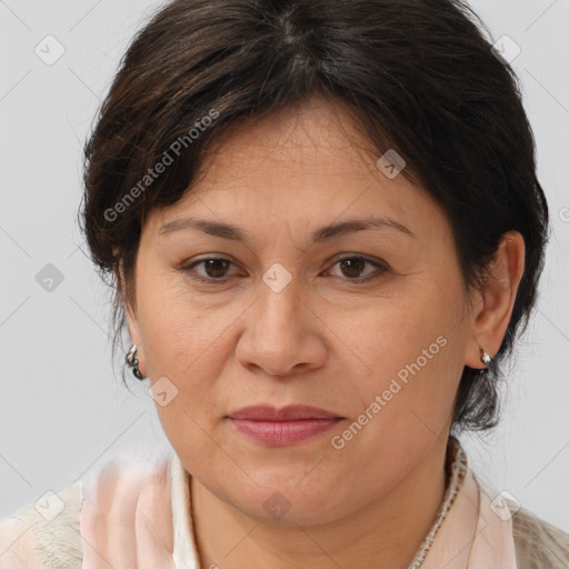 Joyful white adult female with medium  brown hair and brown eyes