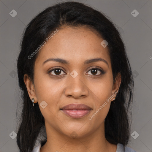 Joyful latino young-adult female with medium  brown hair and brown eyes