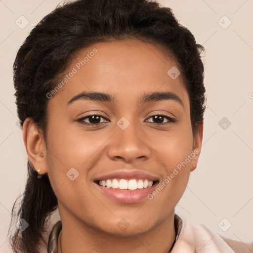 Joyful latino young-adult female with short  brown hair and brown eyes