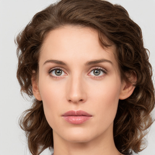 Neutral white young-adult female with medium  brown hair and green eyes