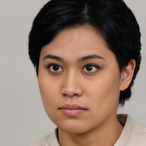 Neutral asian young-adult female with short  black hair and brown eyes