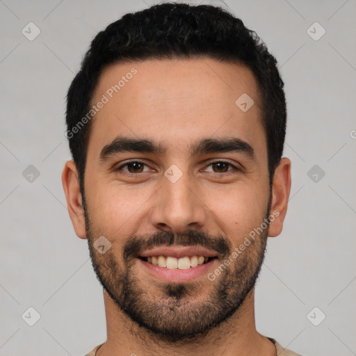 Joyful white young-adult male with short  black hair and brown eyes