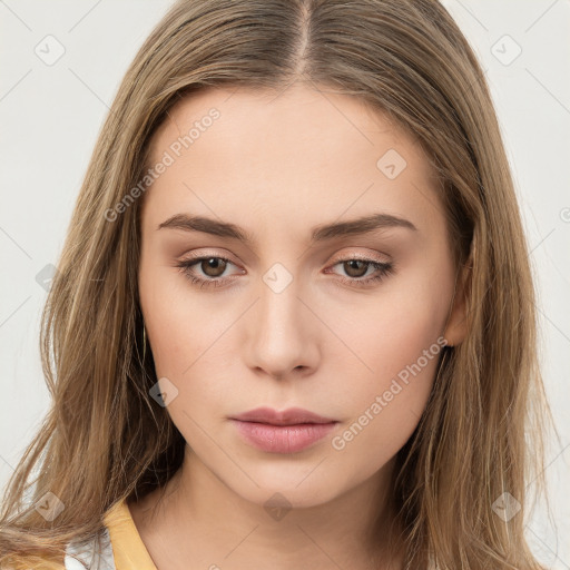 Neutral white young-adult female with long  brown hair and brown eyes