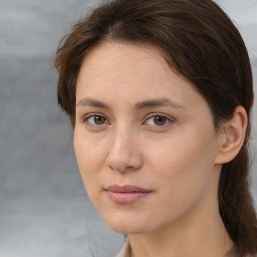 Neutral white young-adult female with medium  brown hair and brown eyes