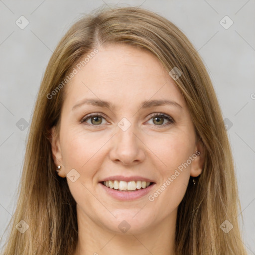 Joyful white young-adult female with long  brown hair and brown eyes