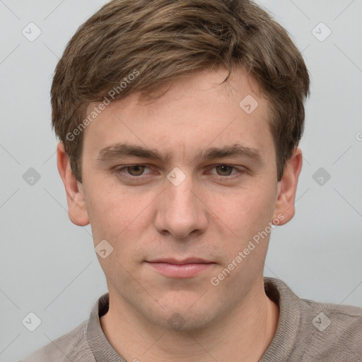 Neutral white young-adult male with short  brown hair and grey eyes