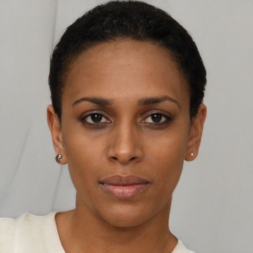 Neutral black young-adult female with short  brown hair and brown eyes