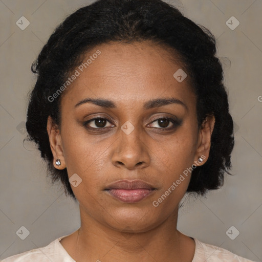 Joyful black young-adult female with medium  black hair and brown eyes