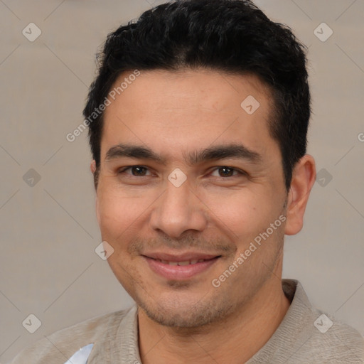 Joyful white young-adult male with short  black hair and brown eyes