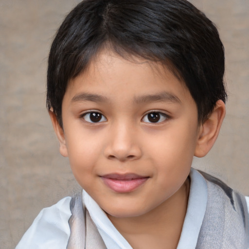 Joyful latino child female with short  brown hair and brown eyes