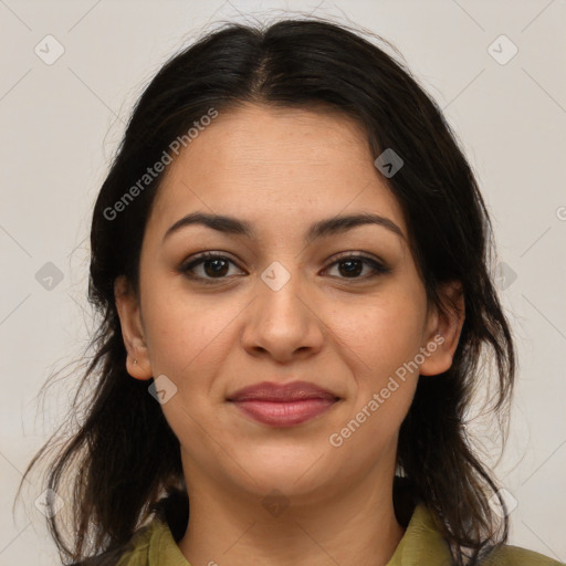 Joyful latino young-adult female with medium  brown hair and brown eyes