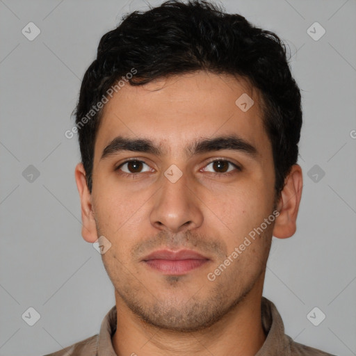 Neutral white young-adult male with short  black hair and brown eyes