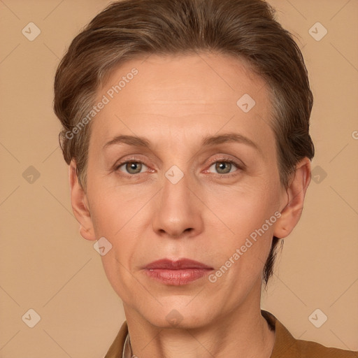 Joyful white adult female with short  brown hair and grey eyes