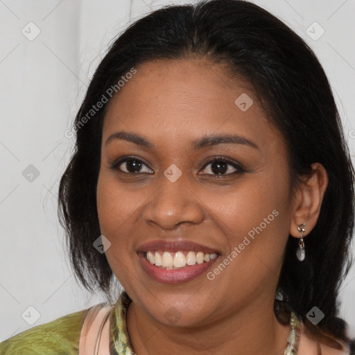 Joyful black young-adult female with medium  brown hair and brown eyes