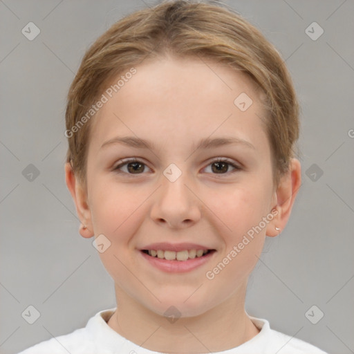 Joyful white child female with short  brown hair and brown eyes