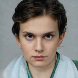 Neutral white young-adult female with short  brown hair and brown eyes