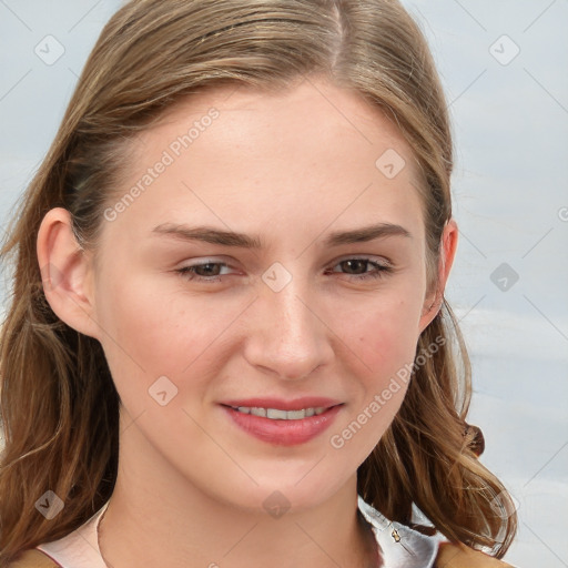 Joyful white young-adult female with medium  brown hair and blue eyes