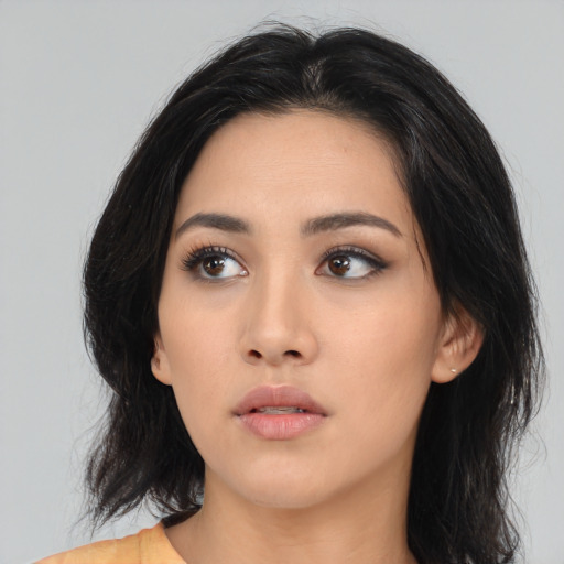 Neutral asian young-adult female with medium  black hair and brown eyes