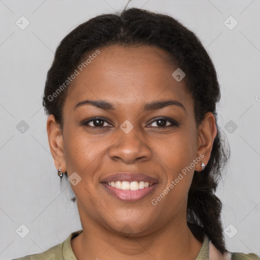 Joyful black young-adult female with short  brown hair and brown eyes